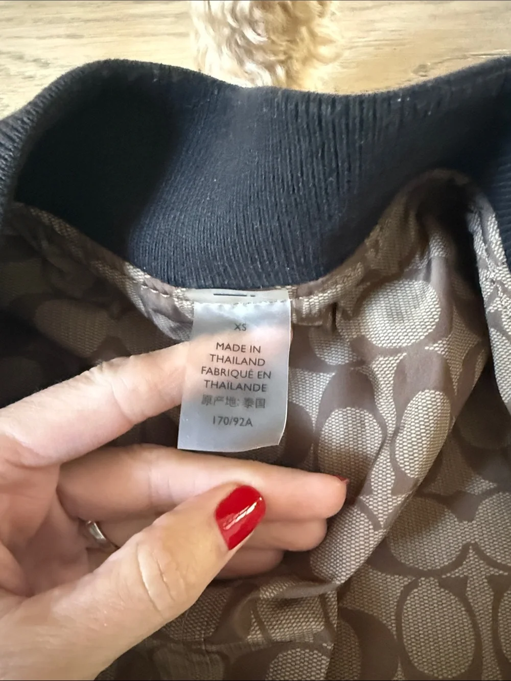 Coach Black Bomber Jacket with Signature Tan Lining